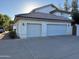 Two-car garage with ample parking space on a concrete driveway, blending functionality with curb appeal at 1454 E Calle De Arcos --, Tempe, AZ 85284