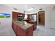 Spacious kitchen with stainless steel appliances, granite counters, and an adjacent dining area at 1454 E Calle De Arcos --, Tempe, AZ 85284