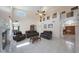 Grand living room featuring high ceilings, a cozy fireplace, and tiled floors, ideal for relaxation at 1454 E Calle De Arcos --, Tempe, AZ 85284