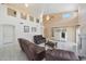 Bright living room with soaring ceilings, comfortable seating, and large windows, creating a spacious and inviting area at 1454 E Calle De Arcos --, Tempe, AZ 85284
