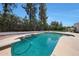 Backyard featuring a beautiful in-ground pool with a diving board and a well-maintained yard at 1454 E Calle De Arcos --, Tempe, AZ 85284
