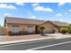 Charming single-story home with a well-maintained yard and inviting curb appeal, perfect for comfortable living at 14821 W Honeysuckle Ln, Surprise, AZ 85374