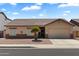 Inviting single-story home featuring desert landscaping, attached garage, and well-maintained exterior in a quiet neighborhood at 14821 W Honeysuckle Ln, Surprise, AZ 85374