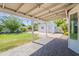 Spacious backyard featuring a covered patio and lush lawn. Includes a separate storage building at 17634 N 34Th Ln, Phoenix, AZ 85053
