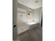 Unfinished bathroom with tiled shower and bathtub at 18941 W Monterosa St, Litchfield Park, AZ 85340
