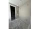 Unfinished dressing room with cement floors at 18941 W Monterosa St, Litchfield Park, AZ 85340