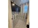 Laundry room with overhead cabinets and a window at 18941 W Monterosa St, Litchfield Park, AZ 85340