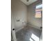 Unfinished laundry room with electrical and plumbing rough in at 18941 W Monterosa St, Litchfield Park, AZ 85340