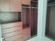 Custom closet design with ample shelving and drawers, maximizing storage space and organization at 25150 N Windy Walk Dr # 14, Scottsdale, AZ 85255