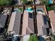 Stunning aerial view showcasing multiple homes, each with private backyard pools at 26243 W Wahalla Ln, Buckeye, AZ 85396
