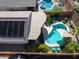 Aerial view of backyard featuring a stunning pool and covered patio at 26243 W Wahalla Ln, Buckeye, AZ 85396