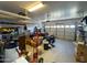 Spacious garage offers ample storage with shelving and overhead racks at 26243 W Wahalla Ln, Buckeye, AZ 85396