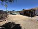 Backyard featuring covered patio and fenced pool area providing privacy and outdoor entertainment at 2719 W Carter Dr, Tempe, AZ 85282