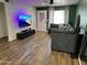Living room features a comfortable sectional and a flat screen television at 2719 W Carter Dr, Tempe, AZ 85282