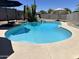 Sparkling blue pool with a smooth, easy-to-maintain deck, perfect for outdoor enjoyment at 2719 W Carter Dr, Tempe, AZ 85282