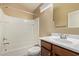 A well-lit bathroom with a vanity, toilet, and shower-tub combo at 2725 E Mine Creek Rd # 2146, Phoenix, AZ 85024
