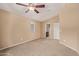 Bedroom featuring a ceiling fan, neutral paint, carpet, and ensuite bathroom at 2725 E Mine Creek Rd # 2146, Phoenix, AZ 85024