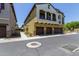Multi-level condo featuring a 3-car garage, private balconies, and neutral tones at 2725 E Mine Creek Rd # 2146, Phoenix, AZ 85024