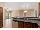 Open kitchen concept featuring a breakfast bar with granite counters and stainless steel appliances at 2725 E Mine Creek Rd # 2146, Phoenix, AZ 85024