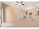 Expansive living room featuring a ceiling fan, tile floors, and an open floor plan at 2725 E Mine Creek Rd # 2146, Phoenix, AZ 85024