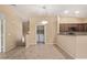 Open concept living room featuring a dining area, in-unit laundry, and neutral paint at 2725 E Mine Creek Rd # 2146, Phoenix, AZ 85024