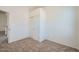 Neutral bedroom with closet, carpet, and light-colored walls at 2729 N Kenton St, Mesa, AZ 85215