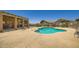 Community pool area with a pool and lounge chairs at 2729 N Kenton St, Mesa, AZ 85215