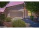 Charming home featuring a neutral stucco facade, a two-car garage, and well-maintained desert landscaping at 2729 N Kenton St, Mesa, AZ 85215