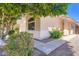 Charming home featuring a neutral stucco facade and desert landscaping at 2729 N Kenton St, Mesa, AZ 85215