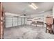 Spacious garage with workbench, overhead storage, and ample space at 2729 N Kenton St, Mesa, AZ 85215
