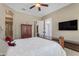 Comfortable bedroom with natural light, wood furniture, and neutral decor at 3058 E Spring Wheat Ln, Gilbert, AZ 85296