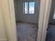 Empty bedroom with window providing natural light at 3428 E Renee Dr, Phoenix, AZ 85050