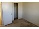 Empty bedroom with carpet and a closet at 3428 E Renee Dr, Phoenix, AZ 85050