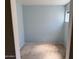 Empty room with light blue walls and carpet at 3428 E Renee Dr, Phoenix, AZ 85050