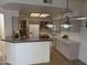 Kitchen with plenty of counter space and white appliances at 3428 E Renee Dr, Phoenix, AZ 85050
