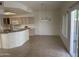 Spacious kitchen area with an open floor plan and adjacent dining space at 3428 E Renee Dr, Phoenix, AZ 85050