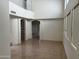 Bright open living room space with high ceilings and many windows at 3428 E Renee Dr, Phoenix, AZ 85050