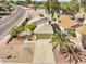 Lovely home boasts mature landscaping, large driveway, and two-car garage at 3855 W Denver St, Chandler, AZ 85226