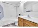 This bathroom features a shower-tub combo and a vanity at 3855 W Denver St, Chandler, AZ 85226