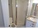 Bathroom features a shower and a sink with a tan countertop and white cabinets at 413 E Bruce Ave # D, Gilbert, AZ 85234
