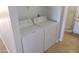 Laundry room with washer and dryer hookups; leads to a nearby bathroom at 413 E Bruce Ave # D, Gilbert, AZ 85234