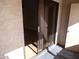 Enclosed patio offering access to the outdoors with sliding door and textured exterior wall at 413 E Bruce Ave # D, Gilbert, AZ 85234