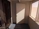 Enclosed patio with outdoor access provides a versatile space for relaxing or storage at 413 E Bruce Ave # D, Gilbert, AZ 85234