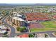Scenic aerial view of condo community with pool, tennis courts, green spaces and easy access to roads at 453 S Parkcrest -- # 416, Mesa, AZ 85206