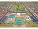 Aerial view of the community amenities, featuring a golf course and tennis courts at 453 S Parkcrest -- # 416, Mesa, AZ 85206