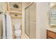 Functional bathroom featuring a toilet, shower, vanity, and modern fixtures at 453 S Parkcrest -- # 416, Mesa, AZ 85206