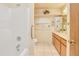An adorable bathroom featuring a tub, vanity, and neutral colored walls at 453 S Parkcrest -- # 416, Mesa, AZ 85206