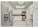 Updated kitchen featuring stainless steel appliances, white cabinets, and tile flooring at 453 S Parkcrest -- # 416, Mesa, AZ 85206