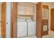 Handy laundry room with a washer and dryer and built in cabinets at 453 S Parkcrest -- # 416, Mesa, AZ 85206