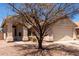 Charming single-story home featuring a two-car garage and covered front porch at 4942 W Novak Way, Laveen, AZ 85339